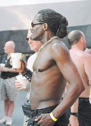 Hot black man at parade